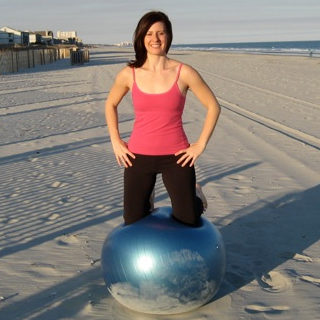 Melissa Koerner on beach on stability ball better beyond 50